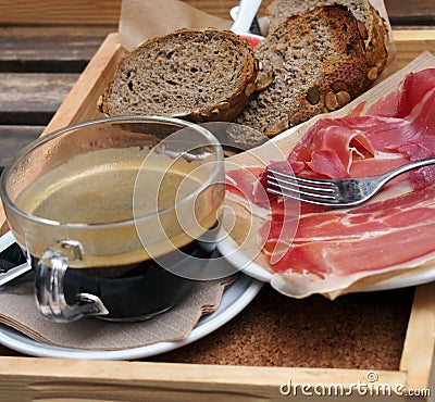 Spanish breakfast â€“ coffee, toasts, jamon Stock Photo